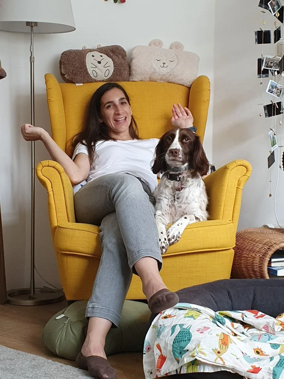 Tatiana seated with her dog